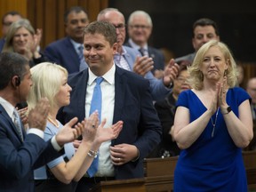 Andrew Scheer receives a standing ovation as he rises to question the government during Question Period in the House of Commons Wednesday, June 19, 2019 in Ottawa.