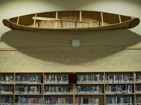 A canoe once belonging to the late Jack MacKenzie hangs in the library at the Regina elementary school bearing his name.