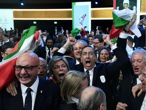 Delegation members representing Milano and Cortina celebrate after the cities won the bid to host the 2026 Winter Olympic Games during the 134th Session of the International Olympic Committee (IOC), at the SwissTech Convention Centre, in Lausanne, Switzerland June 24, 2019. Philippe Lopez/Pool via REUTERS