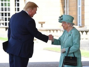 Britain's Queen Elizabeth II greets U.S. President Donald Trump as he arrives for the Ceremonial Welcome at Buckingham Palace, in London, Britain June 3, 2019.