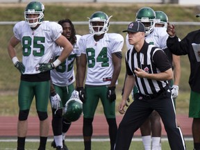 Tim Kroeker, shown working a scrimmage at Roughriders training camp in 2015, will work an NFL pre-season game in August.