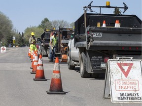 The City of Saskatoon plans to post temporary work zones with speed limits of 30 kilometres per hour to increase safety for workers like those performing road work on Wilson Crescent in 2017.
