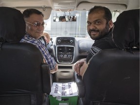 SASKATOON,SK--JULY 08/2019-? News Captain Taxi- Mark Gill, left, and Zuhaib Jahangir pose for a photograph in a vehicle they plan to use for their new company Captain Taxi in Saskatoon, SK on Monday, July 8, 2019.