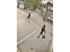 Saskatoon police released this image of two "persons of interest" in connection to the homicide of Daniel Morrison in May. Saskatoon Police Service image.