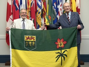 Saskatchewan flag designer Anthony Drake, left, and Saskatchewan flag design selection committee member Percy Schmeiser meet for the first time at Government House.