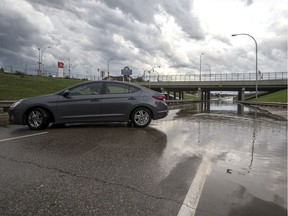 A new report warns that if Saskatoon does not reduce its greenhouse gas emissions severe storms — like the one that flooded the underpass on Idylwyld Drive under Circle Drive this week — will become more common.