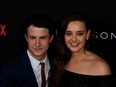 In this photo taken on March 30, 2017 actors Dylan Minnette and Katherine Langford arrive for the premiere Of Netflix's '13 Reasons Why' at Paramount Pictures Studio in Los Angeles, California.
