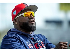 Mar 3, 2019; Fort Myers, FL, USA; Boston Red Sox former player David Ortiz (red hat) walks on the field prior to the game between the Boston Red Sox and the Minnesota Twins at JetBlue Park.