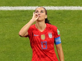 Alex Morgan of the U.S. celebrates in controversial fashion after scoring her team's second goal during the 2019 FIFA Women's World Cup France Semi Final match between England and USA at Stade de Lyon on July 02, 2019 in Lyon, France.