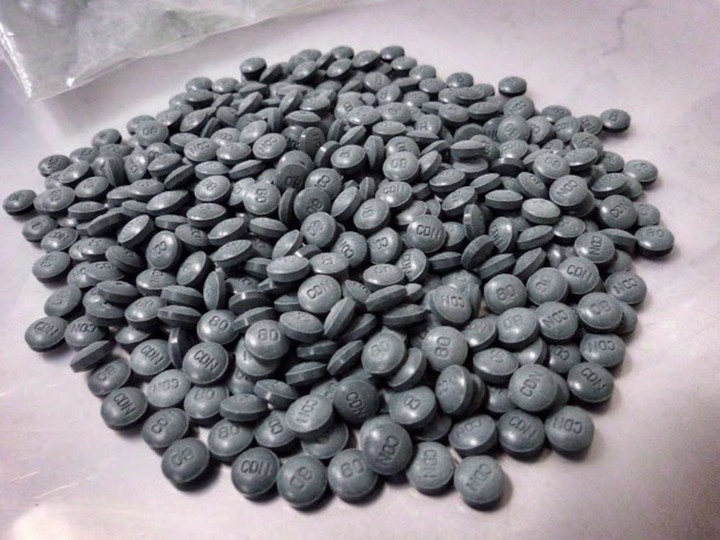  Fentanyl pills are shown in an undated police handout photo. (The Canadian Press)