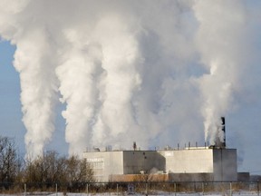 Saskatoon city hall has developed an ambitious plan to reduce greenhouse gas emissions in the city by 80 per cent by 2050. Here, the Queen Elizabeth Power Station is seen in a January 2013 file photo.