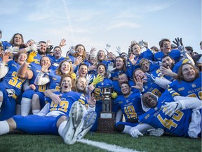 Saskatoon Hilltops celebrate their win against the Langley Rams during the Canadian Bowl championship at SMF Field in Saskatoon,Sk on Saturday, November 17, 2018.