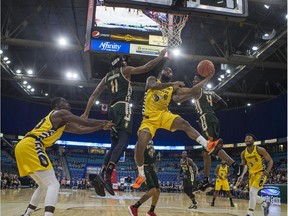 Edmonton Stingers guard Deondre Parks leaps into the air to shoot the ball during the game at SaskTel Centre in Saskatoon, Sk on Thursday, June 6, 2019.