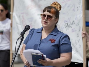 Heather Hale, executive director at Saskatoon Sexual Health, speaks at a rally outside of the premiers' meeting in Saskatoon on Wednesday, July 10, 2019.