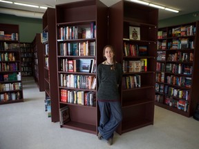 Aimee Martens, the owner of new downtown bookstore Peryton Books, stands for a photo in the recently-opened store on August 15, 2019.