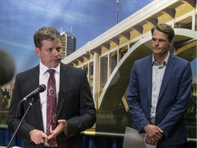 Saskatoon city manager Jeff Jorgenson, left, and Mayor Charlie Clark speak to reporters at city hall in August 2019.