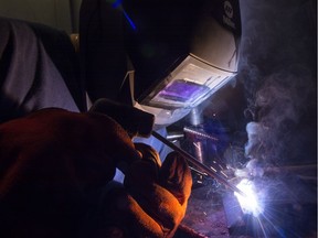 Kennedy Baker, a student in an all-women welding class, lays a bead at Saskatchewan Polytechnic.