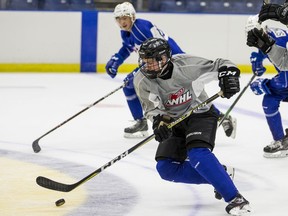 Carson Dobson carries the puck at the Saskatoon Blades' training camp in Saskatoon on Monday, August 26, 2019.