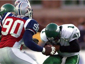 Saskatchewan Roughriders quarterback Henry Burris, 1, is sacked by the Montreal Alouettes on Aug. 3, 2000, when the Green and White lost 62-7.