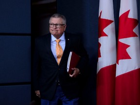 Ralph Goodale, Minister of Public Safety and Emergency Preparedness, arrives to make an announcement regarding the protection of children from online sexual exploitation during a press conference at the National Press Theatre in Ottawa on Tuesday, Aug 6, 2019.