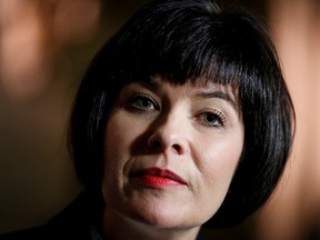 Health Minister Ginette Petitpas Taylor listens to a question during a news conference on Parliament Hill in Ottawa on Nov. 21, 2017.