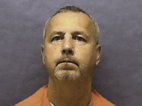 In this photo released by the Florida Department of Corrections and received by AFP on August 22, 2019, convicted murderer Gary Ray Bowles looks on during a booking photo. - A confessed murderer linked to a months-long killing spree in 1994 that targeted older gay men faced execution on August 22, 2019 in the US state of Florida. Gary Ray Bowles, who is 57, was scheduled to be executed by lethal injection in a state prison in the northern city of Starke. Bowles was dubbed the "I-95 killer" after being linked to a half-dozen homicides along the interstate highway of that name, a major artery along the East Coast.