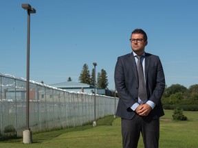 Drew Wilby, Acting Assistant Deputy Minister, Corrections and Policing, stands outside the Regina Correctional Facility.