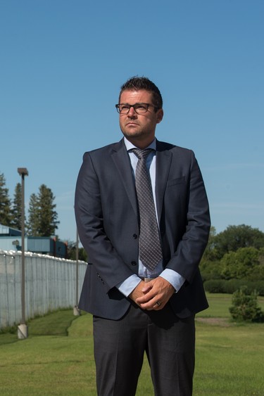 Drew Wilby, Acting Assistant Deputy Minister, Corrections and Policing, stands outside the Regina Correctional Facility.