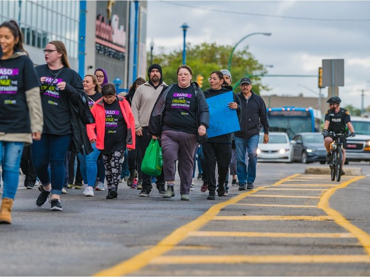  A group of supporters march throughout downtown raising awareness for FASD on Monday, Sept. 9, 2019 in Saskatoon, Sask.