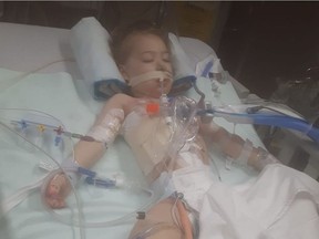 Two-year-old Hailey Wudwud is making a speedy recovery in Royal University Hospital after having a 12-hour surgery. Doctors used part of her stomach to replace part of her esophagus that had torn when she swallowed a plastic teddy bear eye. Photo courtesy of Cyndi Gabora)