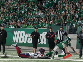 Roughriders quarterback Cody Fajardo scores a deja-vu touchdown Saturday against the Montreal Alouettes, emulating the game-winning major he scored against the Hamilton Tiger-Cats on Aug. 1.