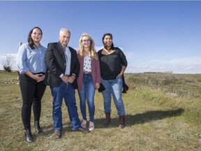 Graduate student Tara Janzenr, left to right, Doctor Ernie Walker, gaduate student Katie Willie, and graduate student Honey Constant at Wanuskewin Heritage Park near Saskatoon, Sask. on Sept. 20, 2019.