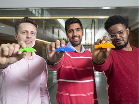 From the left: Soteria MedTech co-founders Cuylar Conly, Yash Shukla and Udoka Okpalauwaekwe hold a Lego-like airway device that could help save lives.
