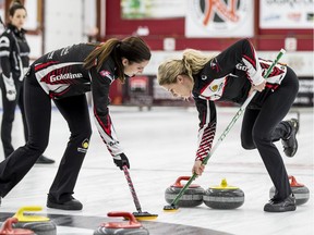Rachel Homan's lead Lisa Weagle and second Ashley Quick sweep in the Colonial Square Ladies Curling Classic Monday.