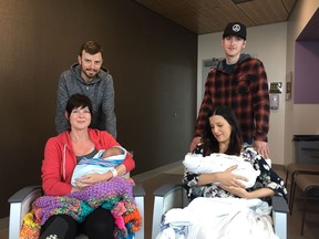 Matthew Friesen and Shannon Lucky (left) baby Hannah was the last born at Royal University Hospital. Jessica Zakoor and Layne Guenther's (right) child Theodore was the first born at the newly-opened Jim Pattison Children's Hospital. The two families met in the new building on September 30.