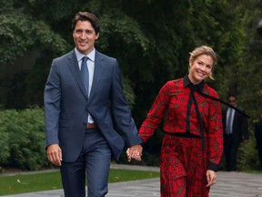 Canada's Prime Minister Justin Trudeau and his wife Sophie Gregoire Trudeau arrive at Rideau Hall to ask Governor General Julie Payette to dissolve Parliament, and mark the start of a federal election campaign in Canada, in Ottawa, Ontario, Canada, September 11, 2019.  REUTERS/Patrick Doyle