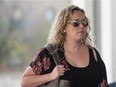 Nurse Carolyn Strom arrives at Court of Queen's Bench where she is appealing a decision sanctioning her for a Facebook post about her grandfather's hospital care. BRANDON HARDER/ Regina Leader-Post