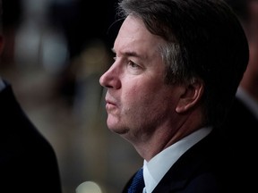 FILE PHOTO: Supreme Court Associate Justice Brett Kavanaugh waits for the arrival of Former president George H.W. Bush to lie in State at the U.S. Capitol Rotunda on Capitol Hill on Monday, Dec. 03, 2018 in Washington, DC.  Jabin Botsford/Pool via Reuters/File Photo