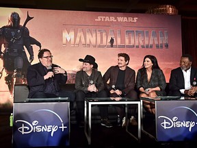 (L-R) Executive producers/writers Jon Favreau, Dave Filoni, actors Pedro Pascal, Gina Carano and Carl Weathers of Lucasfilm's "The Mandalorian" at the Disney+ Global Press Day on October 19, 2019 in Los Angeles, California. "The Mandalorian" series will stream exclusively on Disney+ when the service launches on November 12.