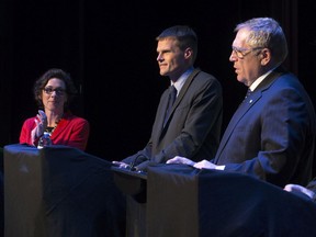 Saskatoon mayoral candidates, left to right, Kelley Moore, Charlie Clark and Don Atchison during the Saskatoon StarPhoenix mayoral debate at the Broadway Theatre, Tuesday, October 11, 2016.