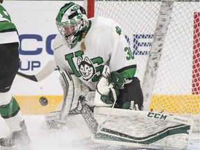 University of Saskatchewan Huskies goalie Jessica Vance stops a shot from the University of Alberta Pandas during U Sports women's hockey action at Merlis Belsher Place in Saskatoon on Friday, October 5, 2018.