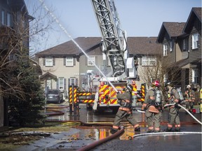Saskatoon Fire Department crews respond to a fire on Langlois way in Stonebridge in Saskatoon, Sk on Saturday, April 27, 2019.