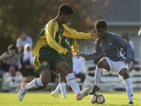 Aden Bowman and Walter Murray squared off in regular-season soccer action last month.