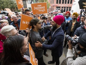 NDP Leader Jagmeet Singh greets supporters following a campaign rally in Saskatoon on Oct. 4, 2019.