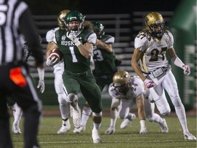 Saskatchewan Huskies' Josh Ewanchyna breaks a 72-yard kick return during Friday's 49-21 win over Manitoba.