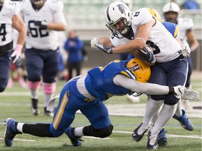 Saskatoon Hilltops linebacker Jadyn Pingue makes a tackle against the Edmonton Wildcats in their regular-season finale at SMF field in on Sunday, October 13, 2019 in Saskatoon.