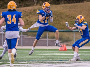 BEST IMAGE   SASKATOON, SKÑOct. 20/2019 Ñ1019 Sports Hilltops  Saskatoon Hilltops defensive back Brant Morrow intercepts a throw as the Saskatoon Hilltops play host to the Edmonton Wildcats in the Prairie Football Conference semi-final playoff game at SMF Field on October 20th, 2019 in Saskatoon, SK.  The Hilltops would go on to win with a final score of 31-7 over Edmonton.