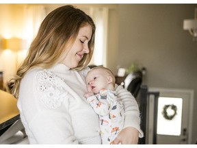 Brittany Caffet holds her 7-week old son Henry.  Henry was diagnosed with Down's Syndrome shortly after he was born, and also has a heart condition that puts him at grave risk should he catch the flu.  Photo taken in Warman, Sask. on Oct. 23, 2019.