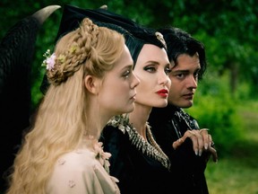 Angelina Jolie, Sam Riley, and Elle Fanning in Maleficent: Mistress of Evil (2019).