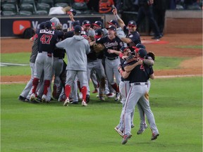 Oct 30, 2019; Houston, TX, USA; Washington Nationals players celebrate on the field after defeating the Houston Astros in game seven of the 2019 World Series at Minute Maid Park. The Washington Nationals won the World Series winning four games to three. Mandatory Credit: Erik Williams-USA TODAY Sports